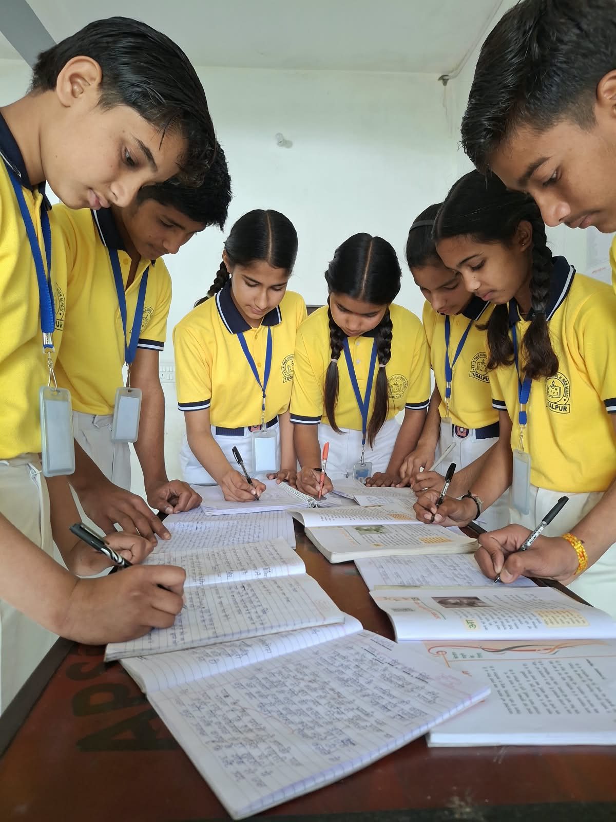 A group of students working through a problem together